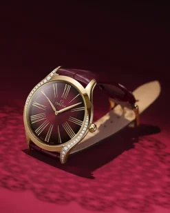 36 mm, Moonshine™ gold on leather strap