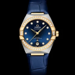 36 mm, steel ‑ yellow gold on leather strap