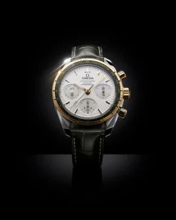 38 mm, steel ‑ yellow gold on leather strap