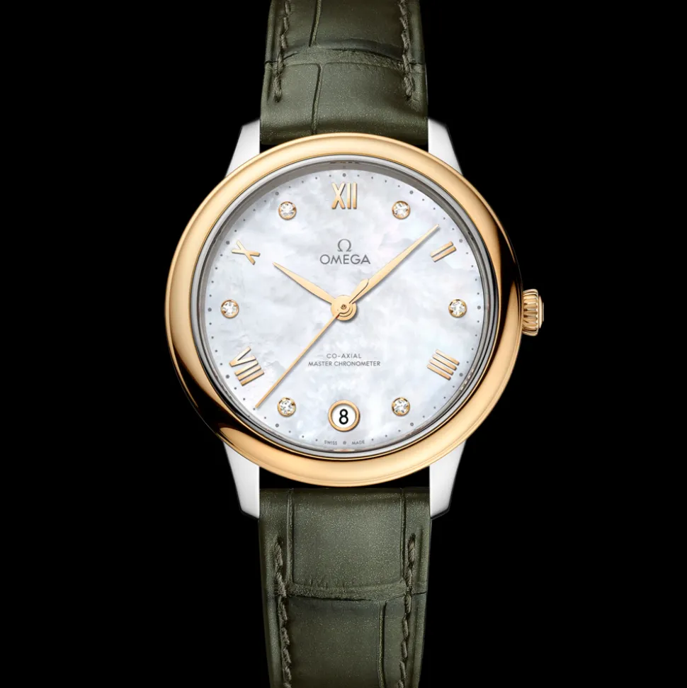 34 mm, steel ‑ yellow gold on leather strap