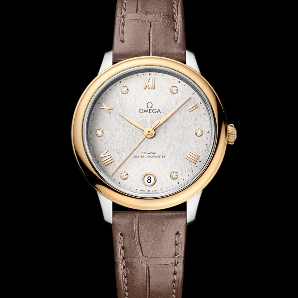 34 mm, steel ‑ yellow gold on leather strap