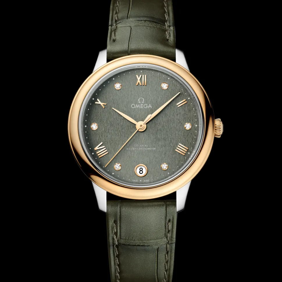 34 mm, steel ‑ yellow gold on leather strap