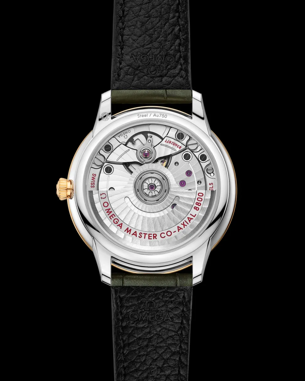 34 mm, steel ‑ yellow gold on leather strap