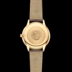 30 mm, yellow gold on leather strap